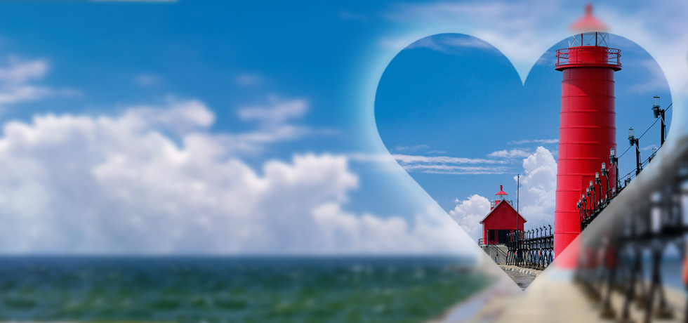 A transparent heart icon on top of a lighthouse along a shoreline.